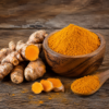 Organic Turmeric from Root to Powder Fresh organic turmeric roots placed beside finely ground turmeric powder on a rustic wooden surface, highlighting natural farm quality.